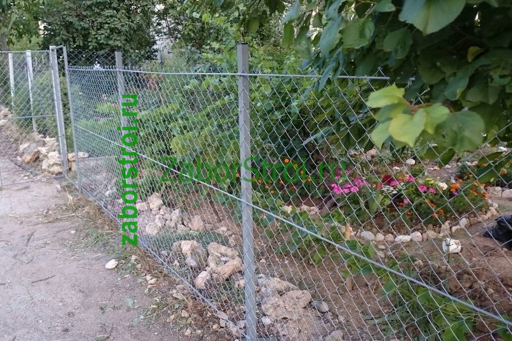 Заборы из сетки рабица в натяг с протяжкой арматуры под ключ с установкой 18 метров